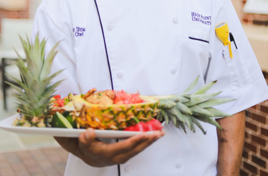 Associate holding pineapple bowl